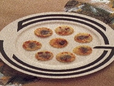 Petits chaussons de pomme de terre aux truffes noires